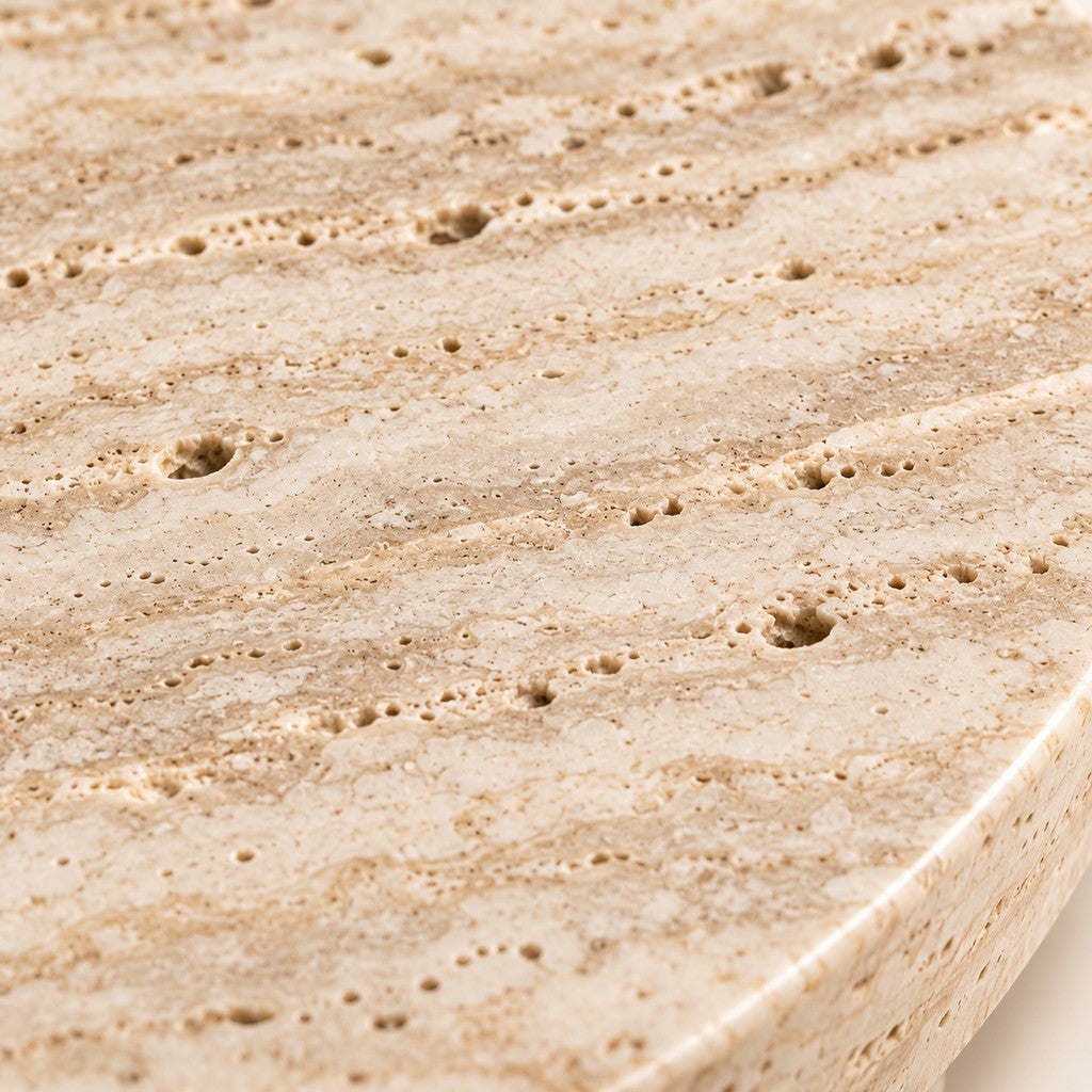 Round Tray with Cut-out Legs: close-up of the Beige Travertine surface