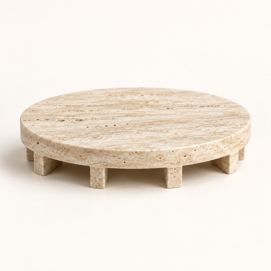 Round Tray with Cut-out Legs in Beige Travertine, studio view