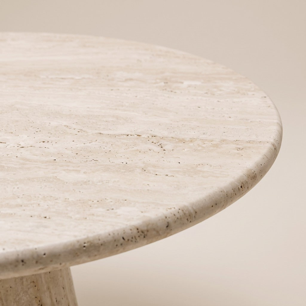Round White Travertine Dining Table — Cone Pedestal: close-up of the stone surface