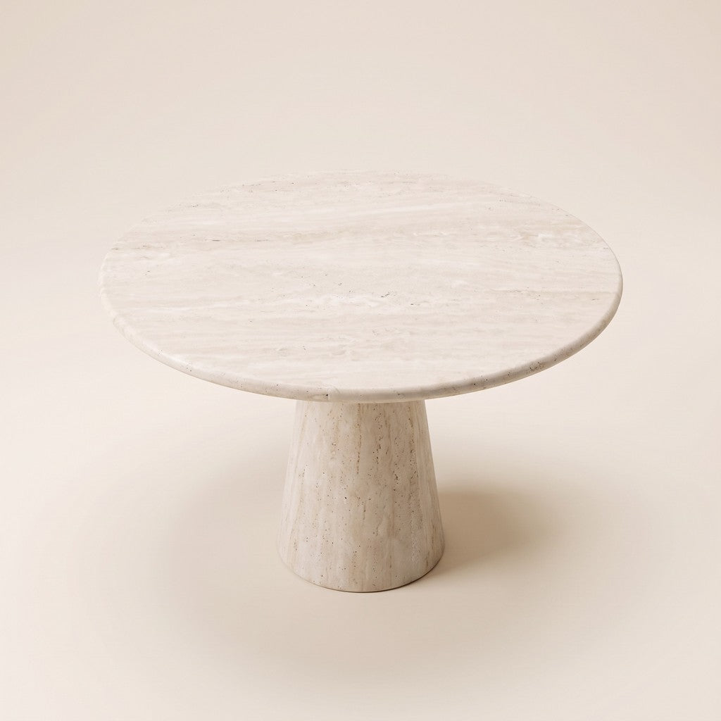 Round White Travertine Dining Table — Cone Pedestal, three-quarter view
