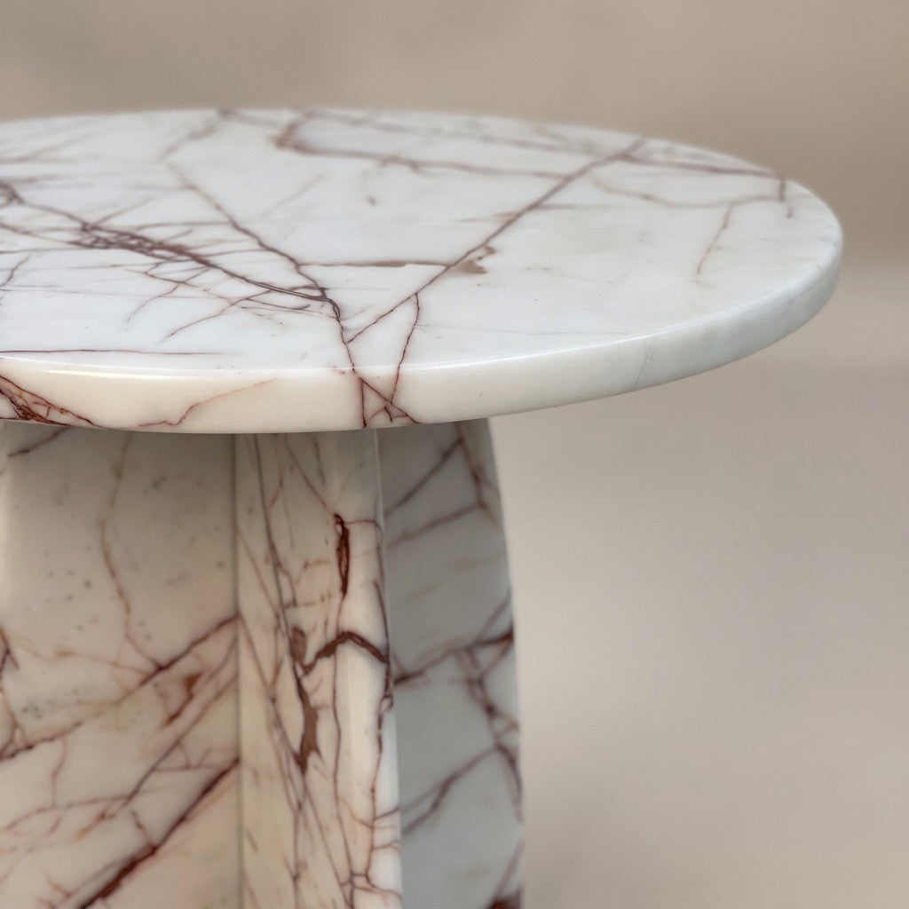 Round White Veined Stone Side Table — Cross Base, edge detail