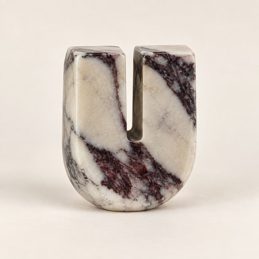 Small Arched Stone Ornament in Calacatta Viola, studio view