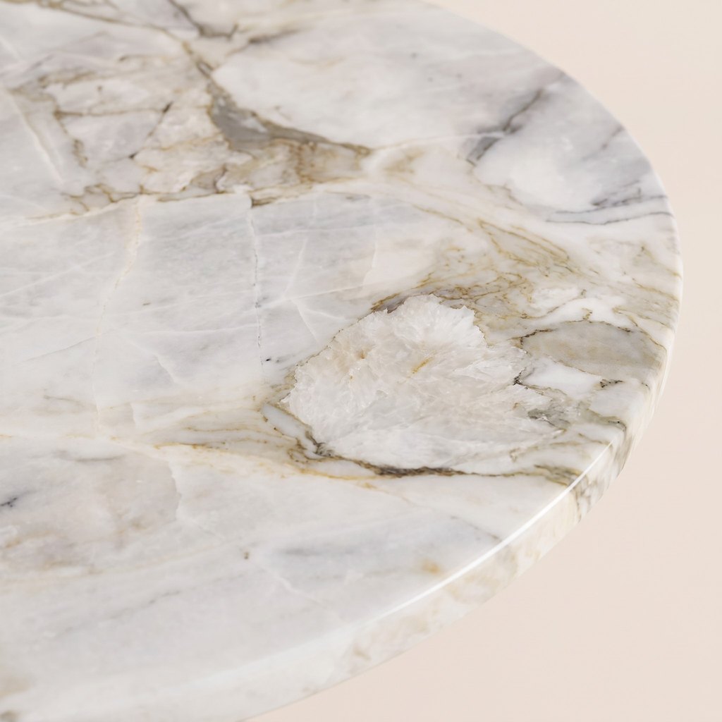 Small Round Marble Side Table: close-up of the white and grey marble surface