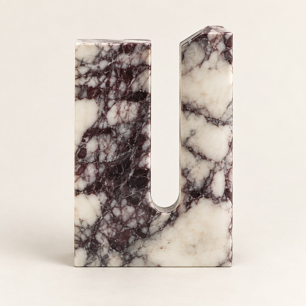 U-Cut Geometric Stone Ornament in Calacatta Viola, studio view